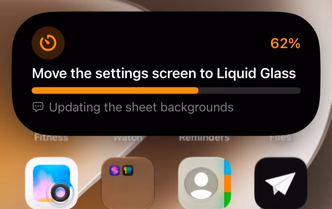 The open Dynamic Island in the Progress Bar layout. It shows the task title, a bar at 62 percent, and the status note.
